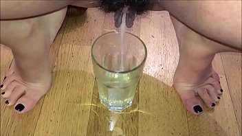 Bushy cunt mature pissing and srinking her own pee